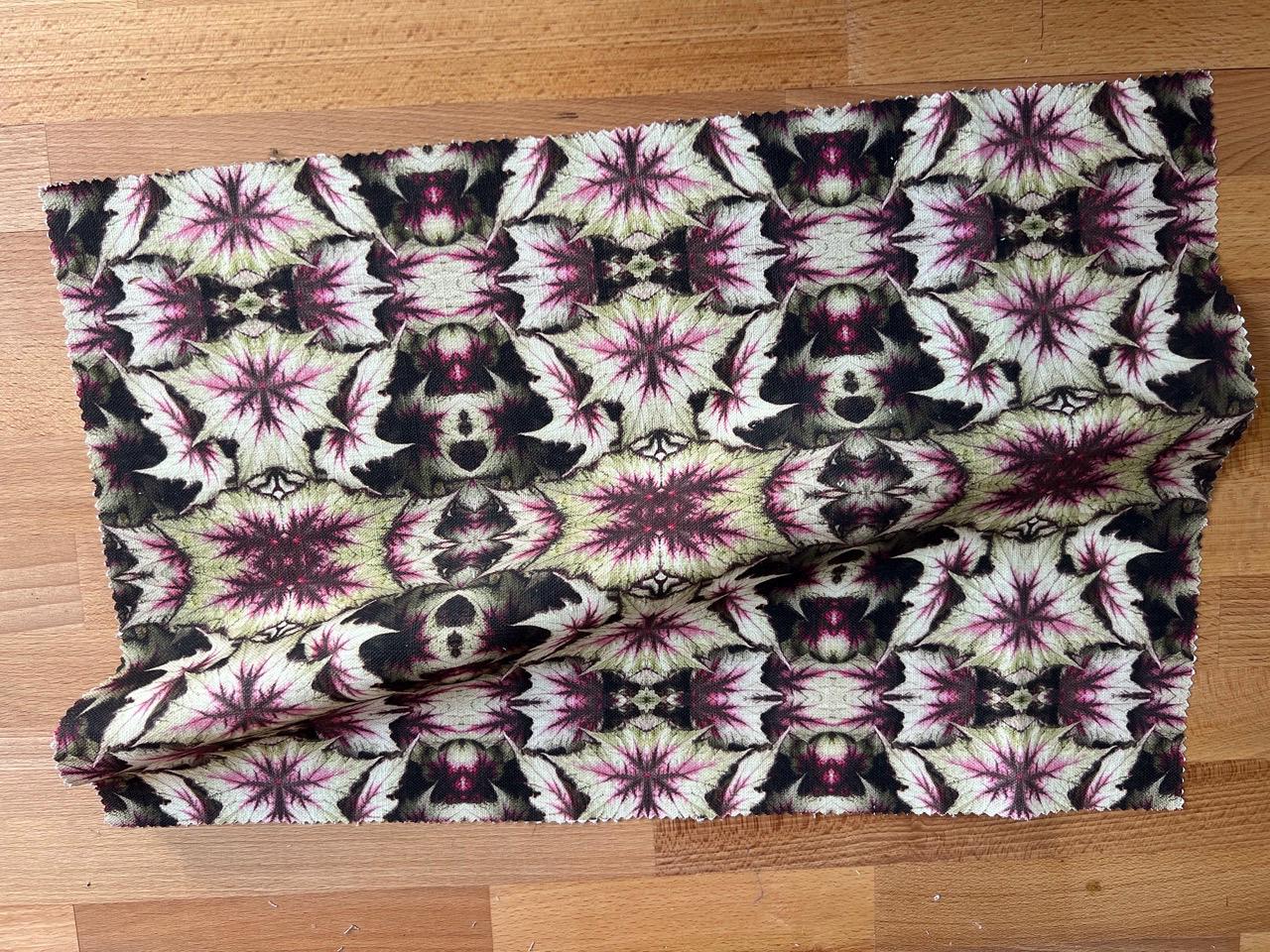 Abstract flower linen fabric, strong pink and green floral textile. Bold designer fabric, contemporary luxury material for home decor.