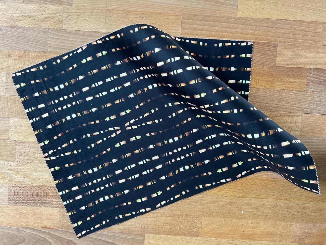 Abstract roof velvet fabric, black and gold textile. Bold designer fabric, contemporary luxury material for home decor. Curtaining.