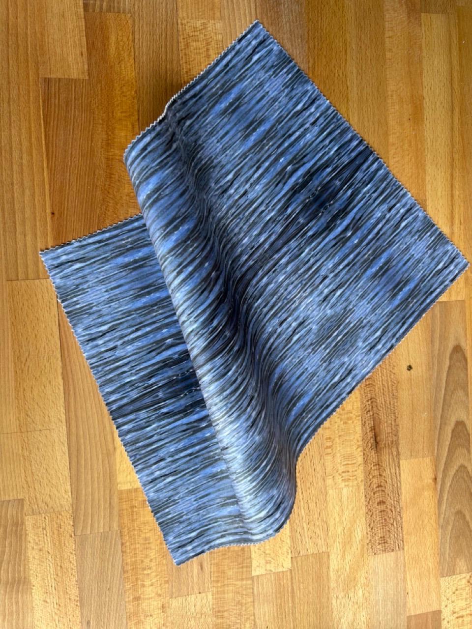 Abstract water velvet fabric, blue water textile. Neutral designer fabric, contemporary luxury material for home decor and curtaining.